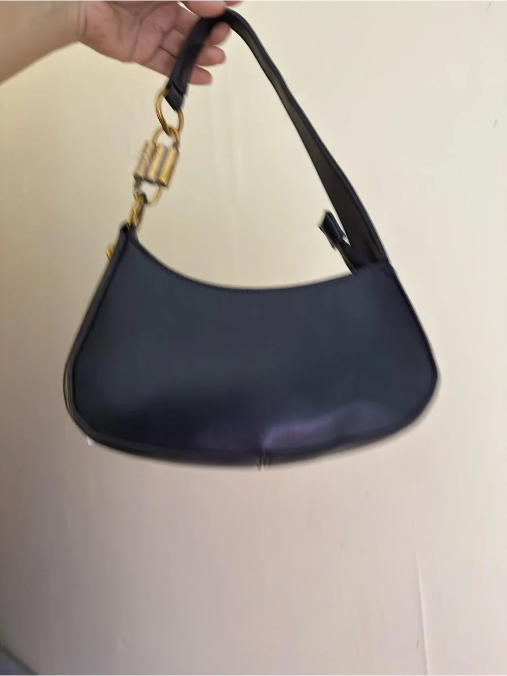 Steve Madden Black Crescent Shoulder Bag with Gold Accents